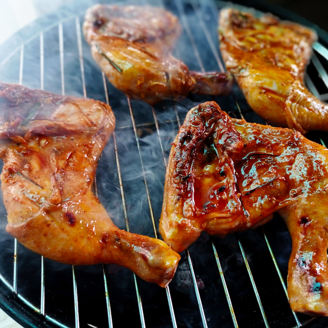 Chicken Leg Quarters on a grill