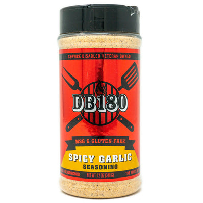 DB180 Spicy Garlic gluten-free BBQ rub in a 12-ounce bottle, featuring garlic and heat seasoning for grilling and smoking.